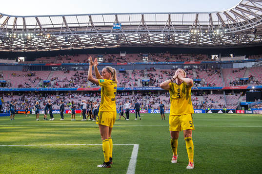 Linda Sembrant and Nilla Fischer of Sweden celebrate
