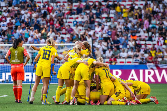 Players of Sweden celebrate