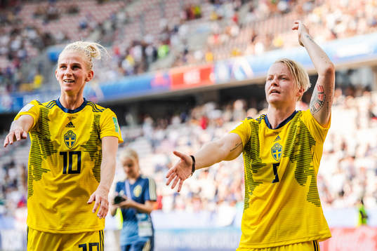 Sofia Jakobsson and Nilla Fischer of Sweden celebrate