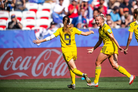 Kosovare Asllani and Hanna Glas of Sweden celebrate the 0-1