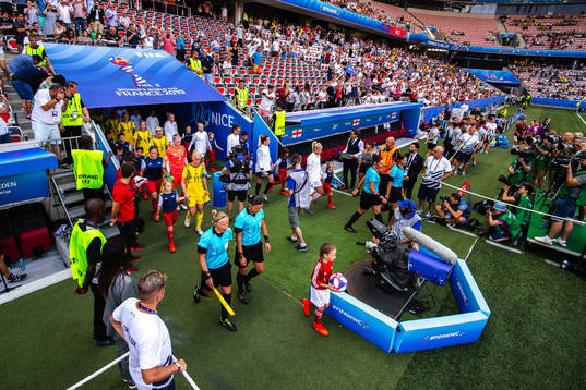 Players of Sweden and of England enters the pitch