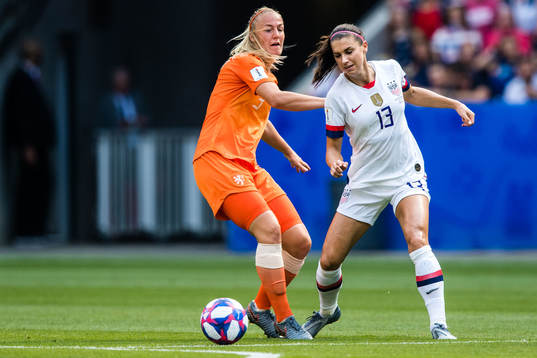 Stefanie Van Der Gragt of Netherlands and Alex Morgan of USA