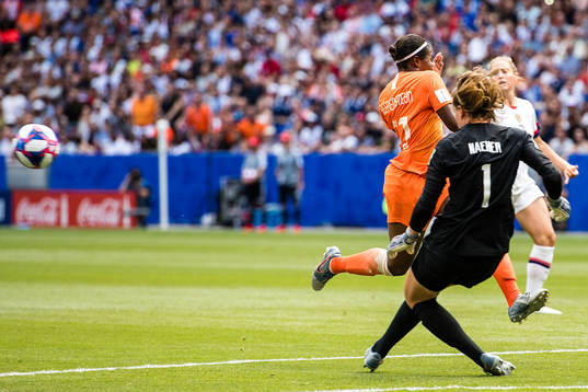 Goalkeeper Alyssa Naeher of USA and Lineth Enid Fabienne