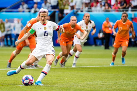Megan Rapinoe of USA scores
