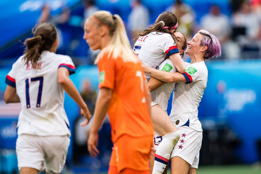 Alex Morgan, Megan Rapinoe and Rose Lavelle celebrates 2-0