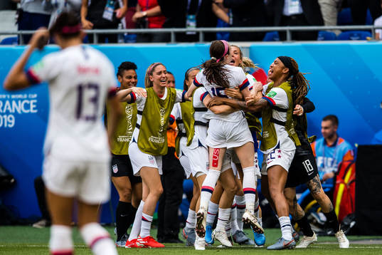 Rose Lavelle of USA celebrates scoring 2-0