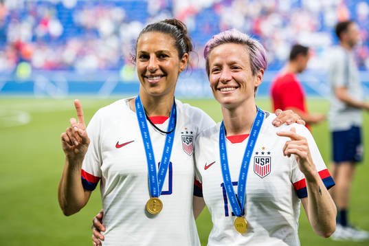 Carli Lloyd  and Megan Rapinoe of USA celebrates winning