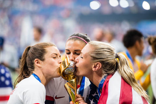 Kelley O'Hara, Ashlyn Harris and Alexandra Long  of USA