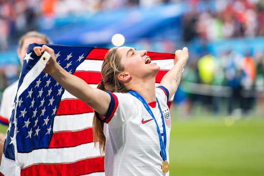 Abigail Dahlkemper  of USA celebrates winning the FIFA