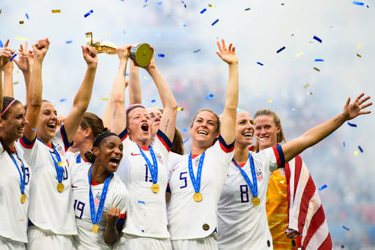Megan Rapinoe of USA celebrate with the trophy
