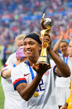 Jessica Mcdonald of USA celebrate with the trophy