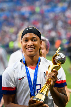 Jessica Mcdonald of USA celebrate with the trophy