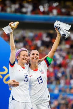 Megan Rapinoe and Alex Morgan of USA celebrate winning the