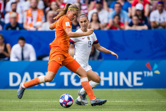 Manieke Anouk Dekker of Netherlands and Alex Morgan of USA