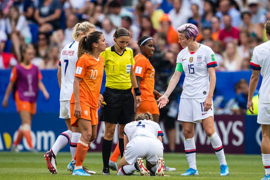 Megan Rapinoe of USA in discussion with referee Stephanie