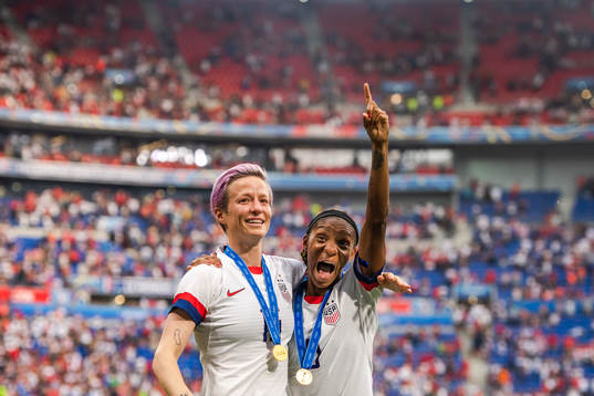 Megan Rapinoe and Crystal Dunn of USA celebrate