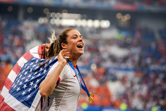 Kelley O'Hara of USA celebrates