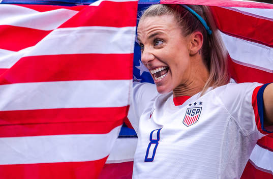Julie Ertz of USA celebrates
