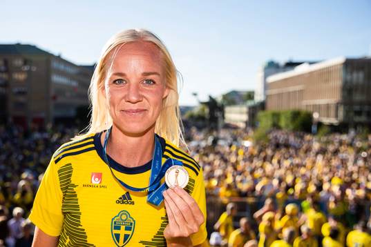 Caroline Seger poses with her medal
