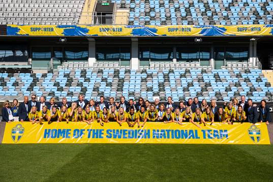 The players pose for a team group photo