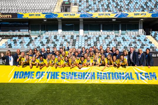 The players pose for a team group photo