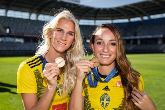Sofia Jakobsson and Kosovare Asllani pose with their medals