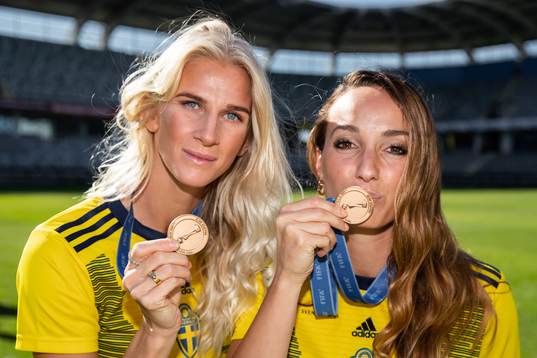 Sofia Jakobsson and Kosovare Asllani pose with their medals