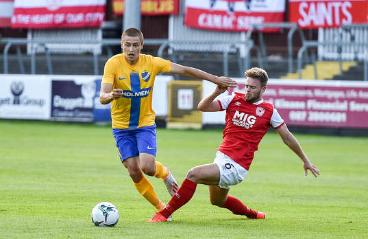 JSimon Thern of IFK Norrköping is tackled by Conor