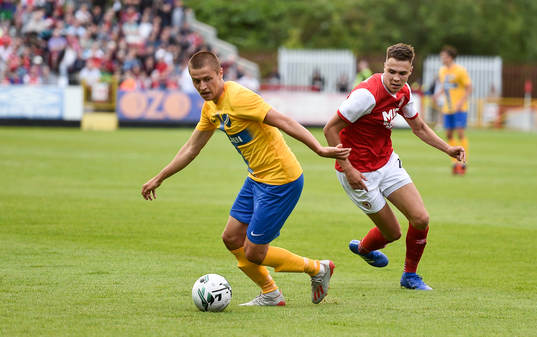 Simon Thern of IFK Norrköping in action against Cian