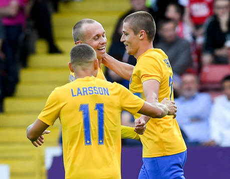 Simon Thern of IFK Norrköping celebrate with teammates