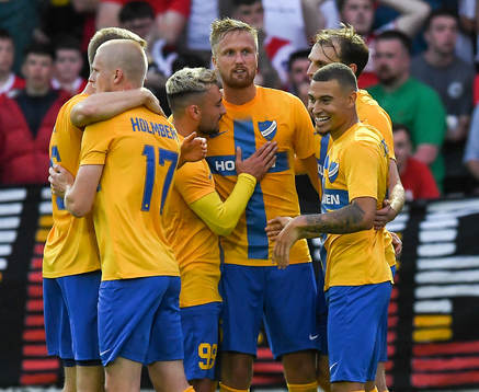 Kasper Larsen,centre, of IFK Norrköping is congratulated