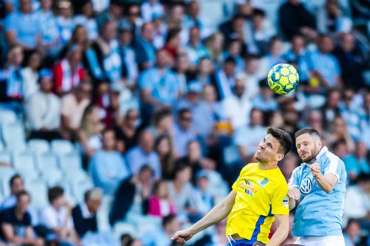 Adam Lecky of Ballymena United and Lasse Nielsen of Malmö
