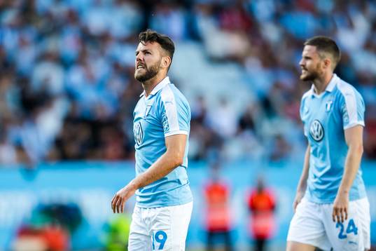 Erdal Rakip and Lasse Nielsen of Malmö FF look dejected