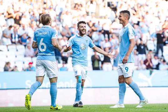 Oscar Lewicki and Erdal Rakip celebrate with Markus