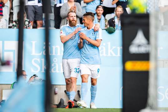 Jo Inge Berget and Markus Rosenberg celebrate