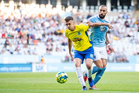 Scot Whiteside of Ballymena United and Guillermo Molins of