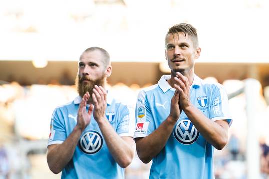 Jo Inge Berget and Markus Rosenberg of Malmö FF thank the