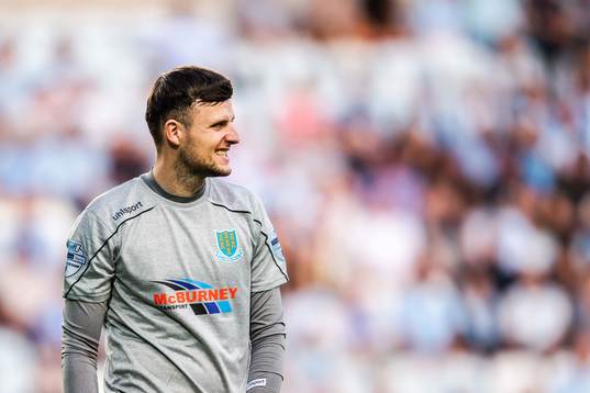 Goalkeeper Ross Glendinning of Ballymena United looks