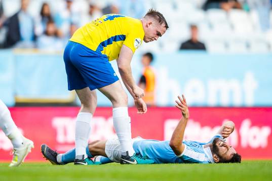 Andrew Burns of Ballymena United checks in