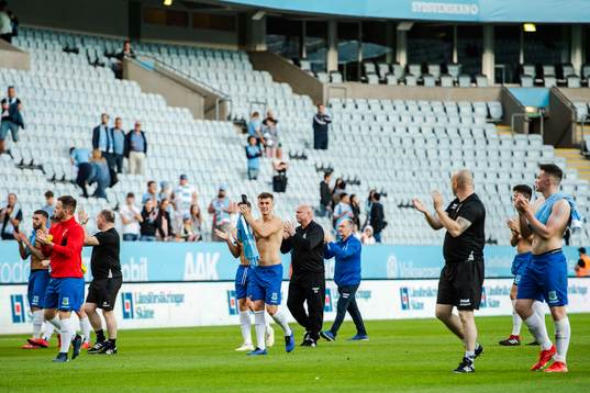 Players of Ballymena United thank the supporters