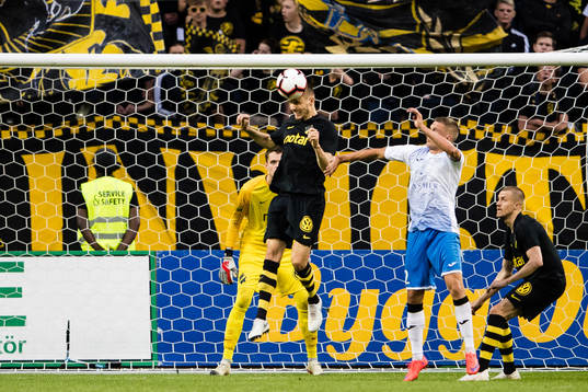Karol Mets of AIK clears the ball