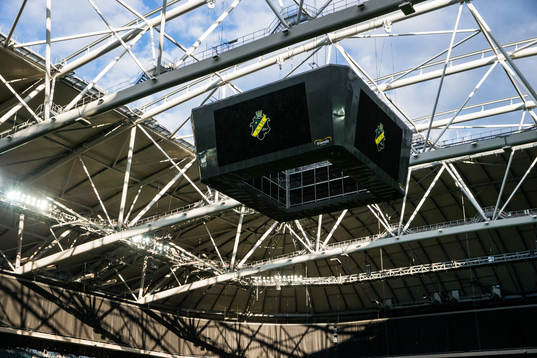 The big screen presents the AIK logo