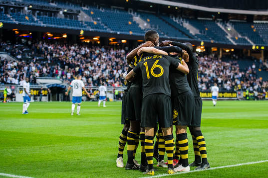 Henok Goitom of AIK celebrates with teammates