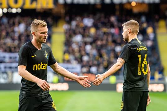 Sebastian Larsson and Anton Salétros of AIK celebrate
