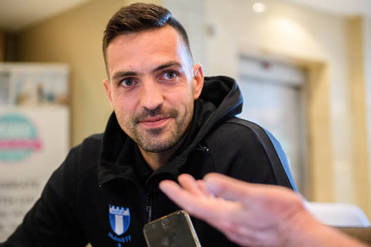 Goalkeeper Dusan Melicharek of Malmö FF talks to media