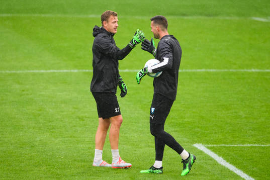 Goalkeeper Johan Dahlin and goalkeeper Dusan Melicharek of