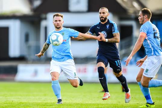 Ryan Mayse of Ballymena United and Guillermo Molins of