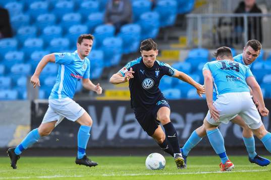 Marcus Antonsson of Malmö FF and Kofi Balmer of Ballymena