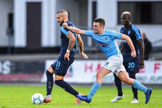 Guillermo Molins of Malmö FF and Shane McGinty of