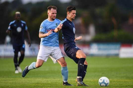 Marcus Antonsson of Malmö FF and Ryan Harpur of Ballymena